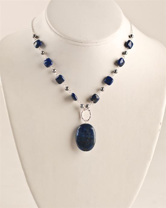 Appraisal: A Lapis and Sterling Necklace with a lapis pendant on