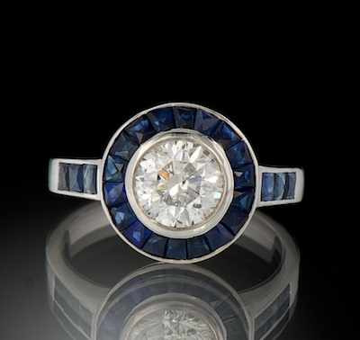 Appraisal: An Art Deco Style Diamond and Sapphire Ring k white