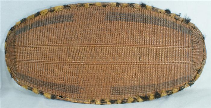 Appraisal: African woven woven reed and wood shield animal hide decorative