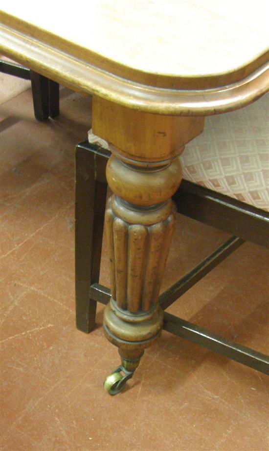 Appraisal: A VICTORIAN MAHOGANY EXTENDING DINING TABLE on turned fluted legs