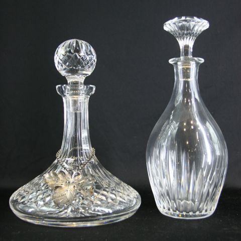 Appraisal: A Baccarat crystal decanter together with a cut glass ships