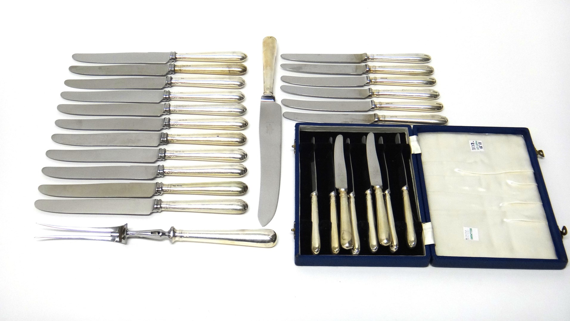 Appraisal: Eight silver handled tea knives with steel blades with an