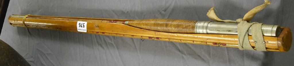 Appraisal: American bamboo fishing rod contained within a cylindrical open fitted