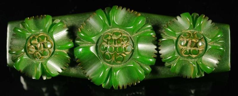 Appraisal: Bakelite Green Pin with Moveable Flowers Condition Excellent Size -