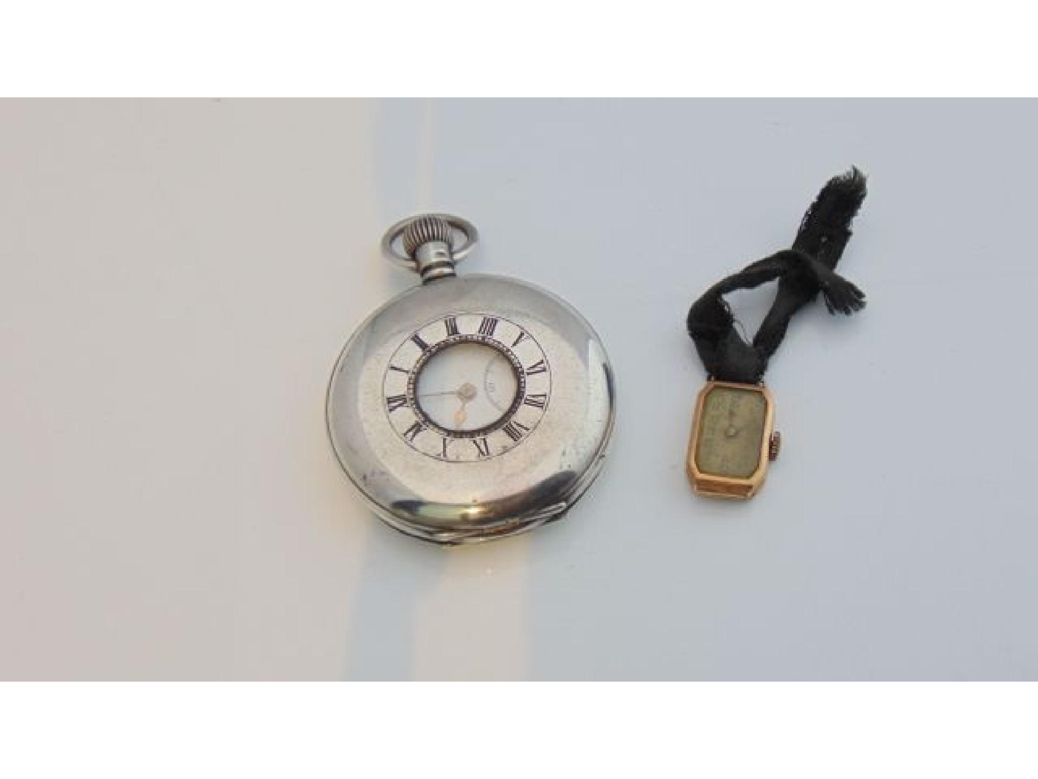 Appraisal: An Edwardian silver half-hunter pocket watch Birmingham the white enamelled