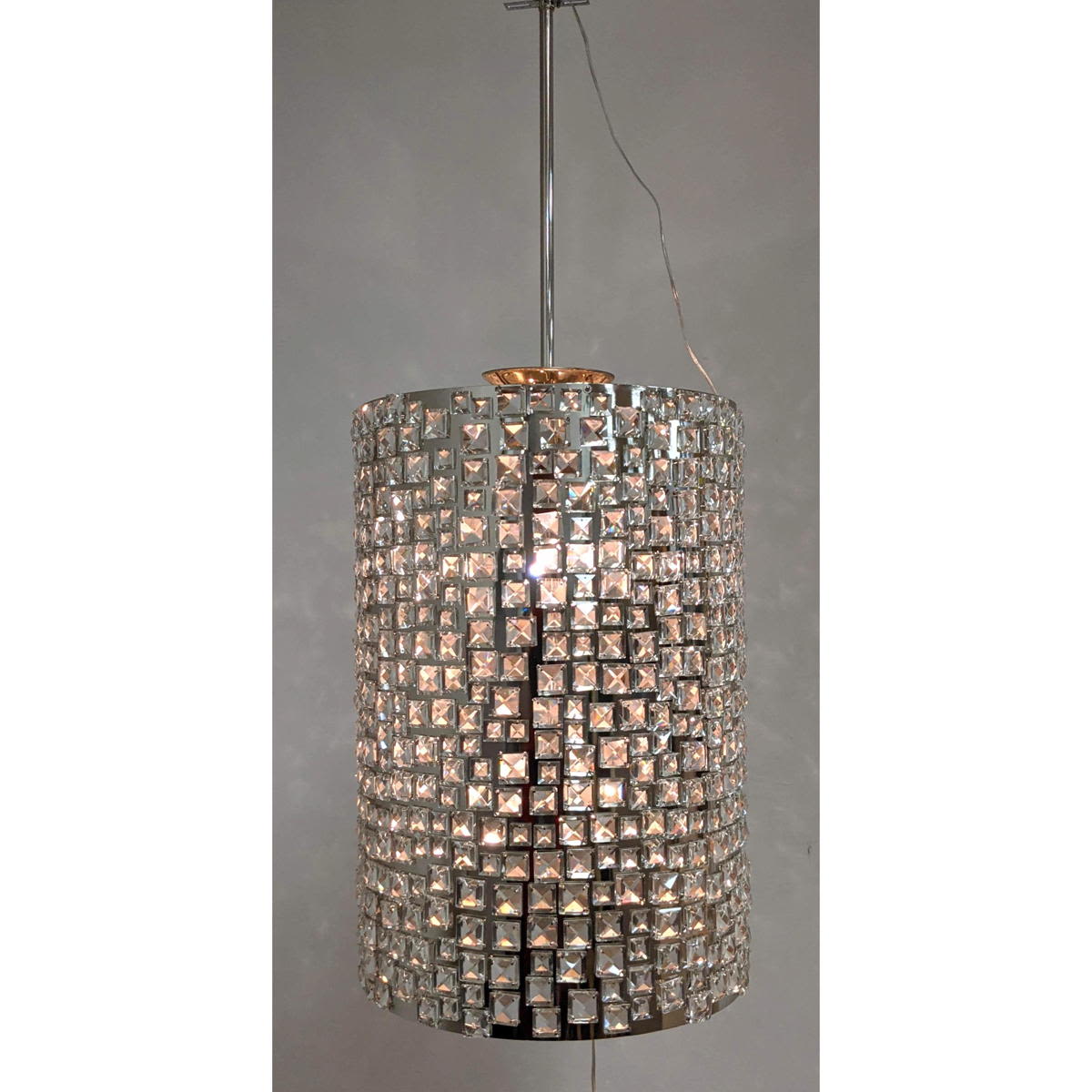 Appraisal: Large Chrome Drum Form Chandelier Square Cut-Outs illuminate square faceted