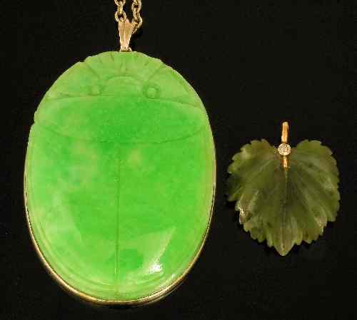 Appraisal: A s Chinese green celadon jade oblong scarab pattern pendant