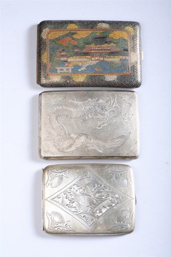 Appraisal: TWO JAPANESE SILVER CIGARETTE BOXES Together with polychrome copper box