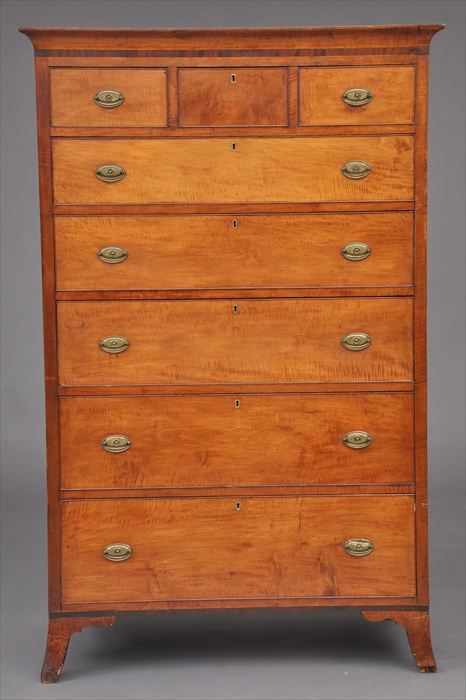 Appraisal: NEW ENGLAND BIRCH AND CHERRY TALL CHEST OF DRAWERS The