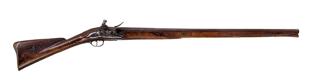 Appraisal: AN EARLY TH CENTURY BRITISH FLINTLOCK MUSKET A heavy and