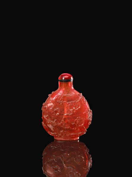 Appraisal: A red glass snuff bottle imitating tourmaline - Of flattened