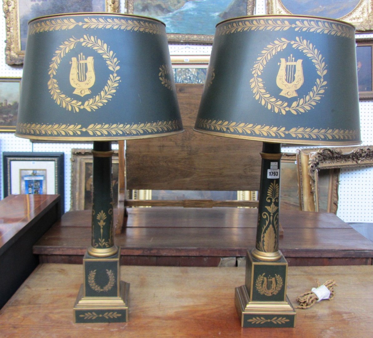 Appraisal: A pair of Regency style tole piente table lamps modern