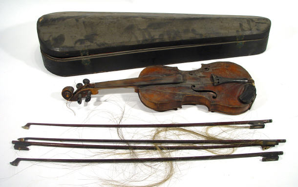 Appraisal: Old wooden violin and mother of pearl inlaid bow -