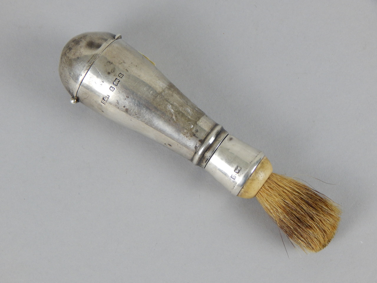 Appraisal: An unusual late Victorian shaving brush the tapering hollow handle