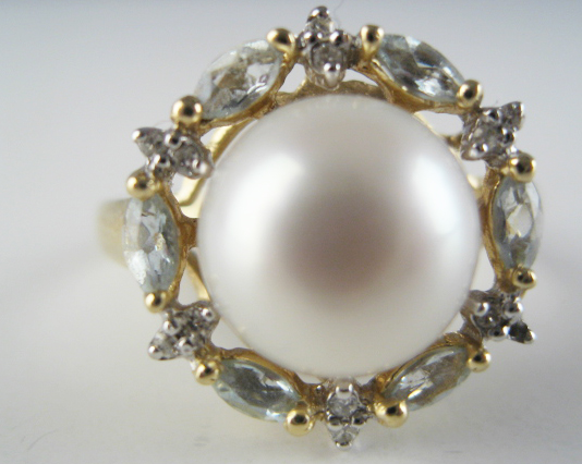 Appraisal: A Gold Pearl Aquamarine and Diamond Ring K marked yellow