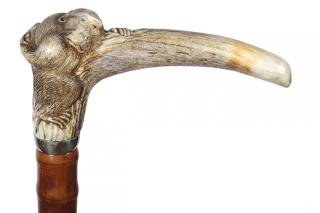 Appraisal: Japanese Stag Monkey Ca a carved stag handle with two