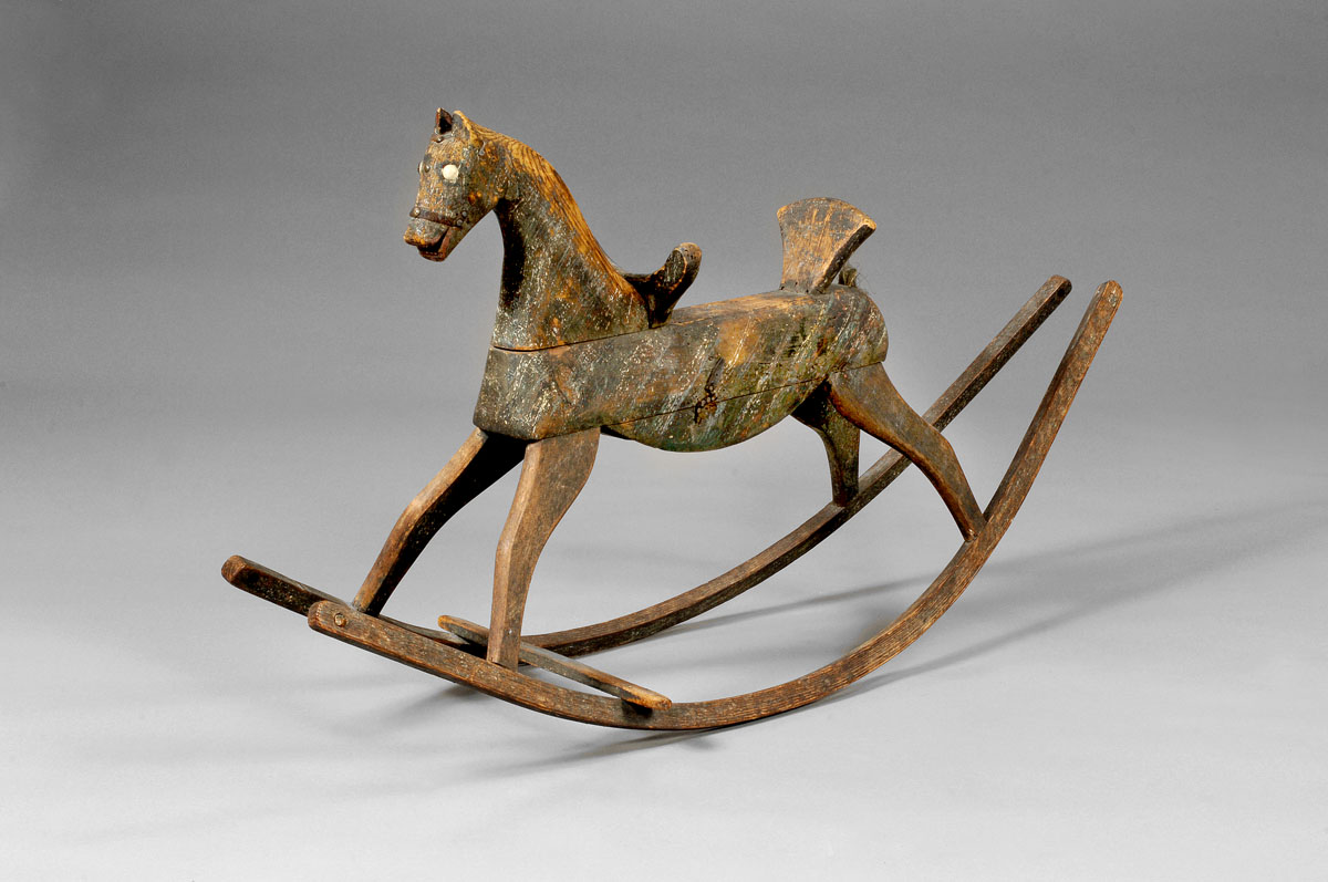 Appraisal: AMERICAN FOLK ART CARVED PINE ROCKING HORSE Retains remnants of