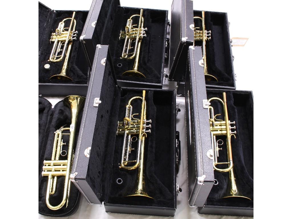 Appraisal: Six Jupiter brass trumpets all cased