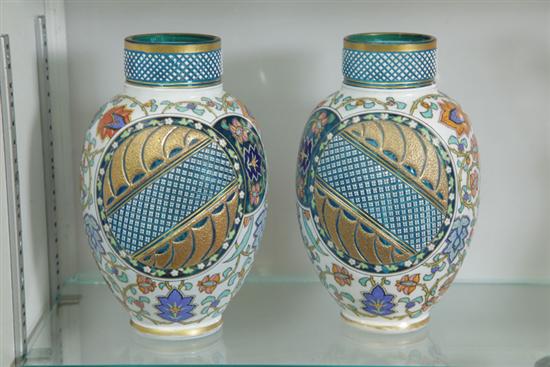 Appraisal: PAIR OF CUT OVERLAY VASES White cut to blue with