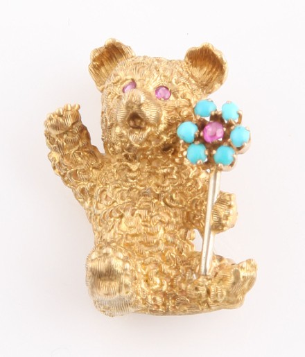 Appraisal: KY Italy teddy bear with ruby eyes bear holding flower