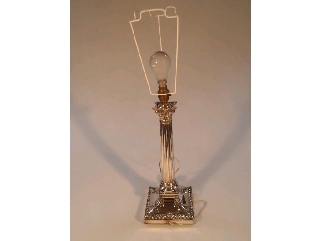 Appraisal: An early thC silver plated composite column table lamp on