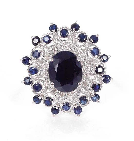 Appraisal: Blue sapphire and diamond cocktail ring ctw natural sapphires accented