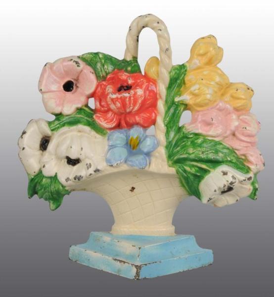 Appraisal: Cast Iron Poppies and Snapdragon Doorstop Description Made by Hubley