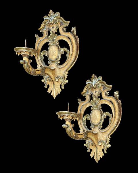 Appraisal: A good pair of Italian Baroque parcel gilt ochre painted