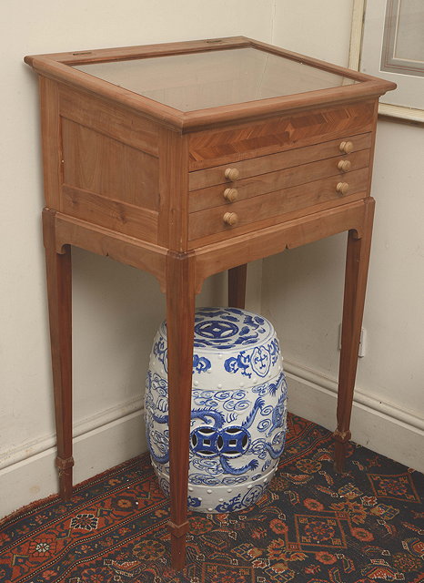 Appraisal: A CHINESE BLUE AND WHITE GARDEN SEAT decorated with four