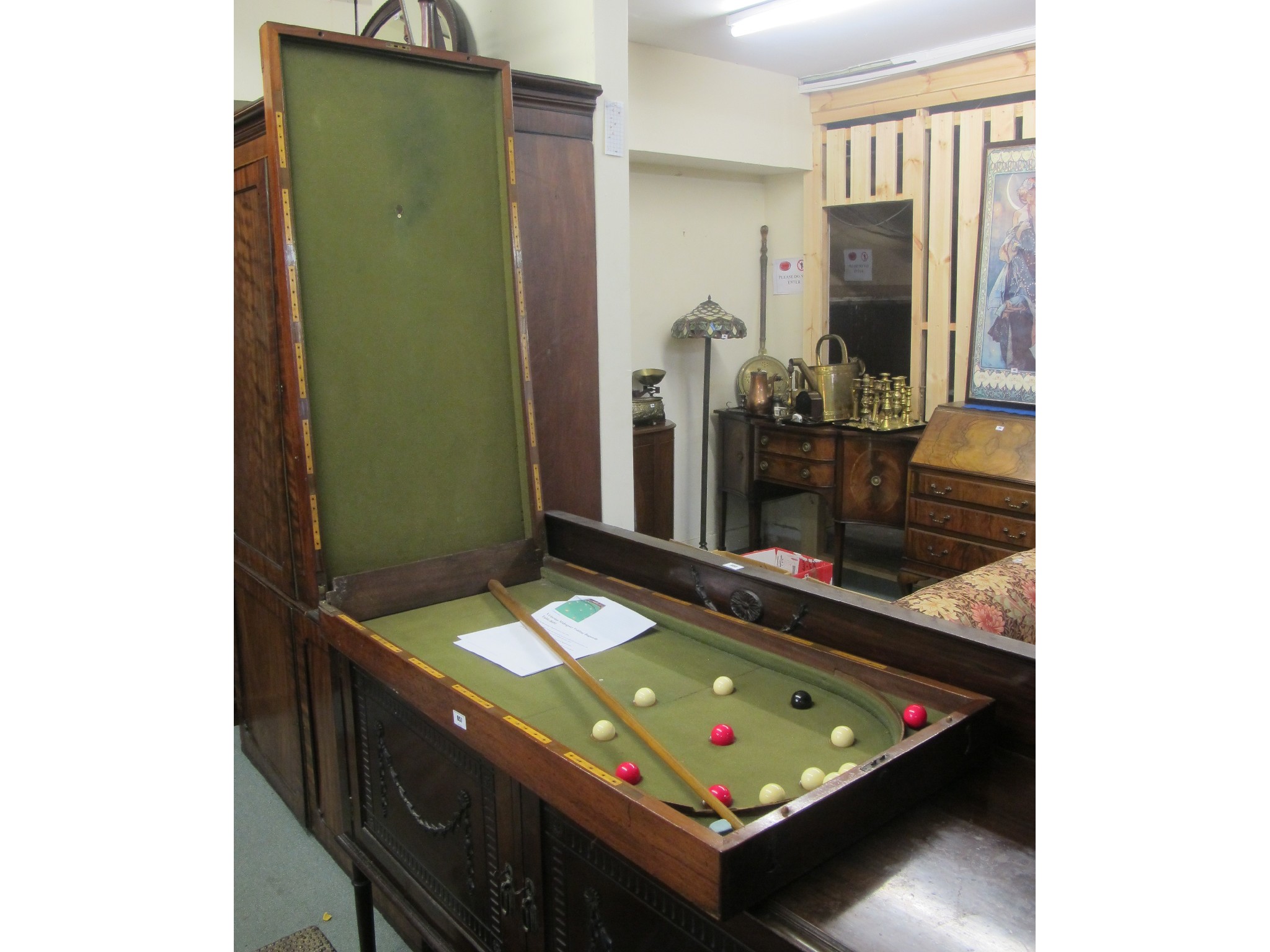 Appraisal: A late Victorian mahogany folding bagatelle table with cues and