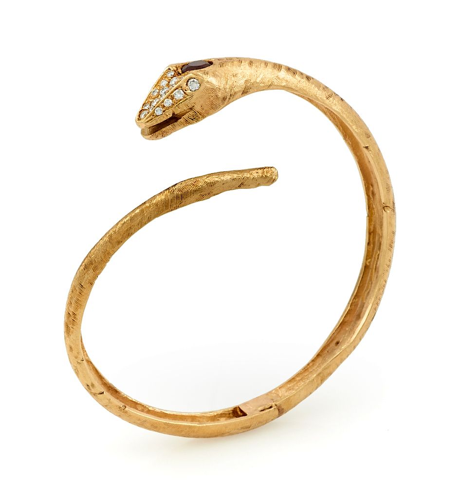 Appraisal: k Yellow gold garnet diamond snake bangle bracelet k Yellow