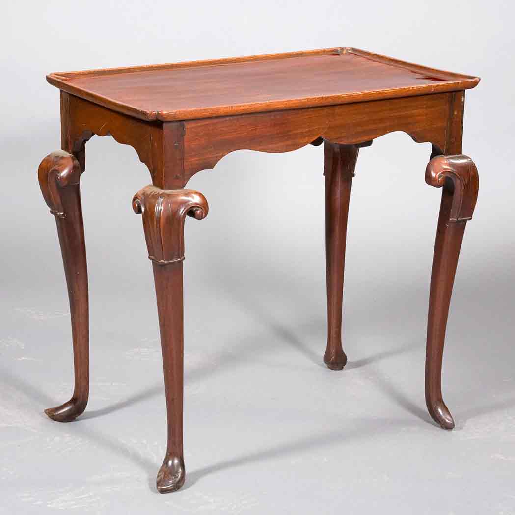 Appraisal: George II Mahogany Silver Table The dished rectangular top raised