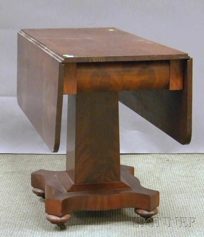 Appraisal: Empire Mahogany and Mahogany Veneer Drop-leaf Pedestal-base Table