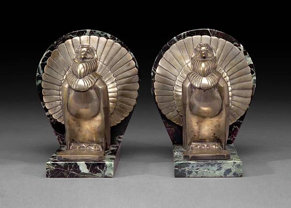 Appraisal: A pair of English Art Deco silvered bronze and marble