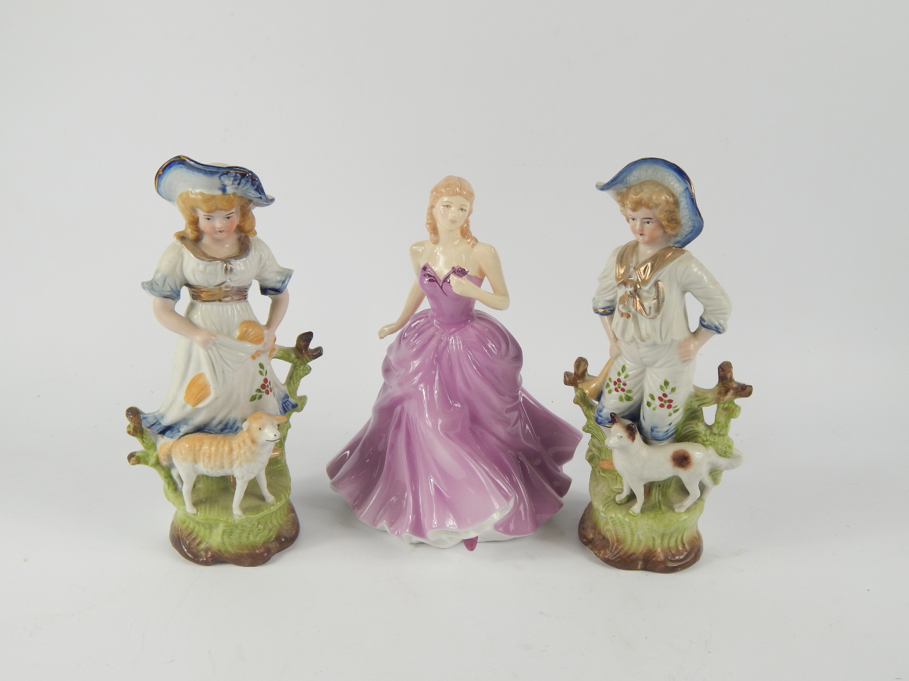 Appraisal: A pair of French late thC Porcelain figures of a