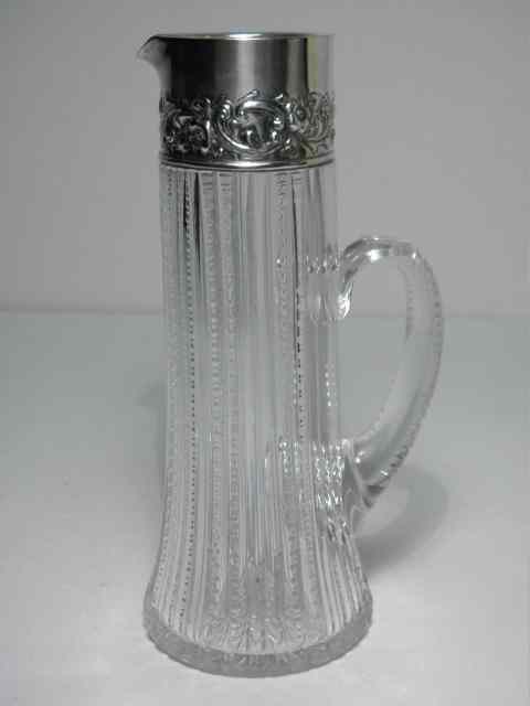 Appraisal: Cut crystal and sterling silver mounted pitcher by Dominick and