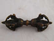 Appraisal: A Tibetan bronze Vajra length cm probably th century