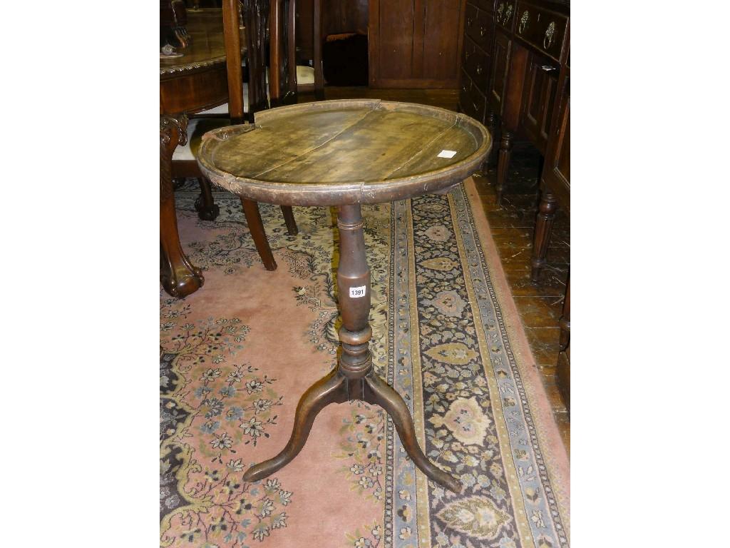 Appraisal: A Georgian mahogany snap top occasional table the circular tray