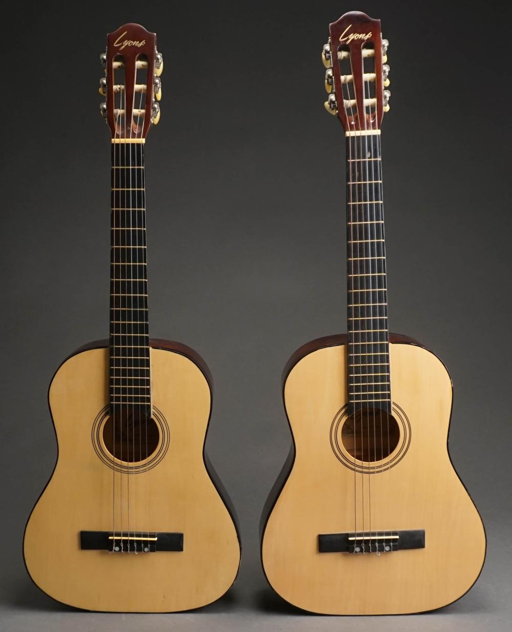 Appraisal: TWO LYONS ACOUSTIC GUITARS WITH CARRYING CASES L IN CM