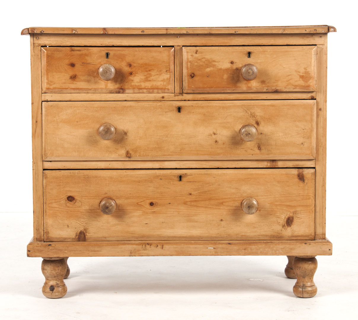 Appraisal: English scrubbed dealwood four-drawer chest Two short drawers and two