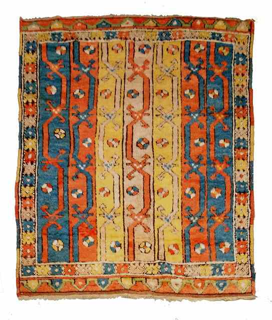 Appraisal: A CAUCASIAN THICK PILE RUG seven vertical bands on polychrome