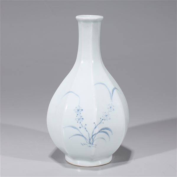 Appraisal: Korean blue and white porcelain faceted vase with floral designs