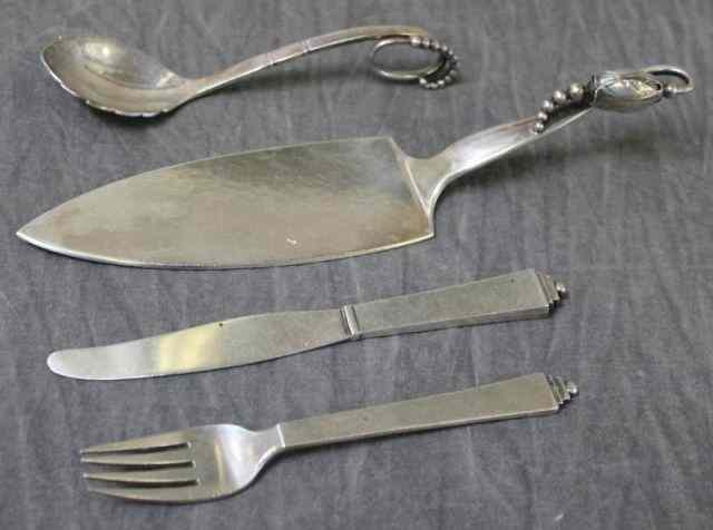 Appraisal: STERLING Georg Jensen Serving Utensils Includes a blossom pattern pie