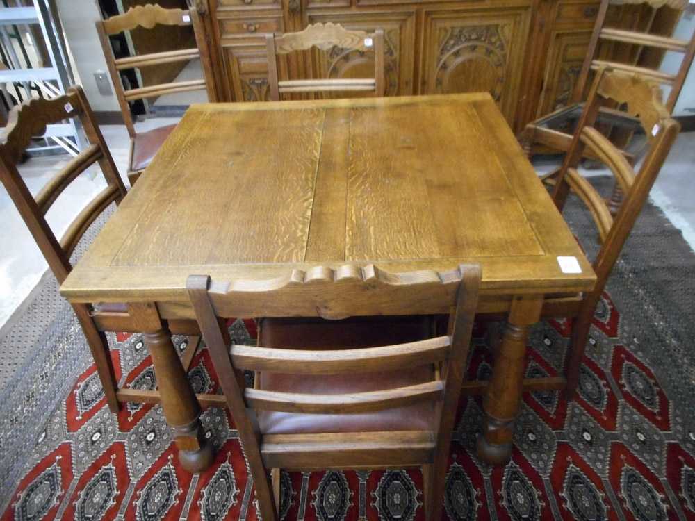 Appraisal: AN OAK DINING TABLE AND A SET OF SIX CHAIRS