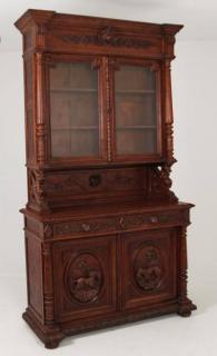 Appraisal: EUROPEAN CARVED OAK BOOKCASE WITH OVAL CARVED PANEL DOORS DEPICTING