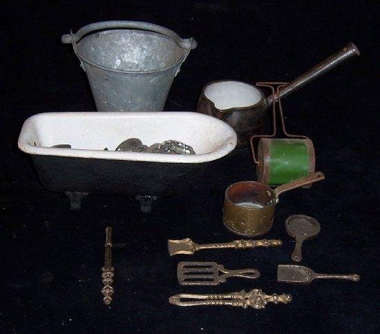 Appraisal: A galvanised pail a roll top bath and other doll's