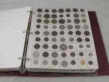 Appraisal: A coin album containing an extensive collection of ancient and