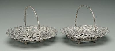 Appraisal: Pair silver plated oval baskets woven bases fern ribbon and