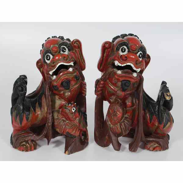 Appraisal: Chinese Carved Wood Foo Dogs Chinese A pair of carved