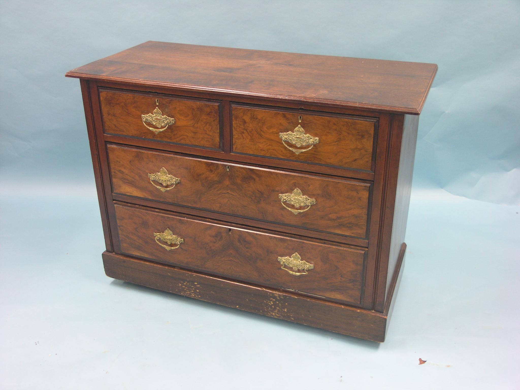 Appraisal: A late Victorian walnut chest two short and two long